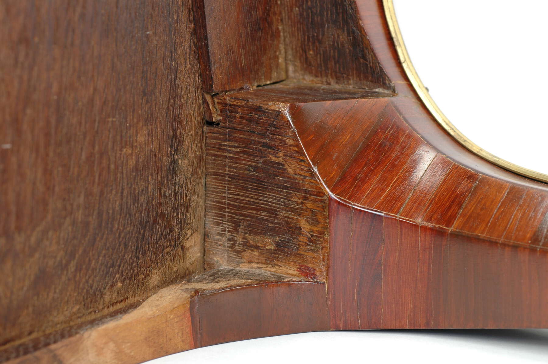 detail of the leg joinery, showing multicolored wooden pieces fitted tightly together