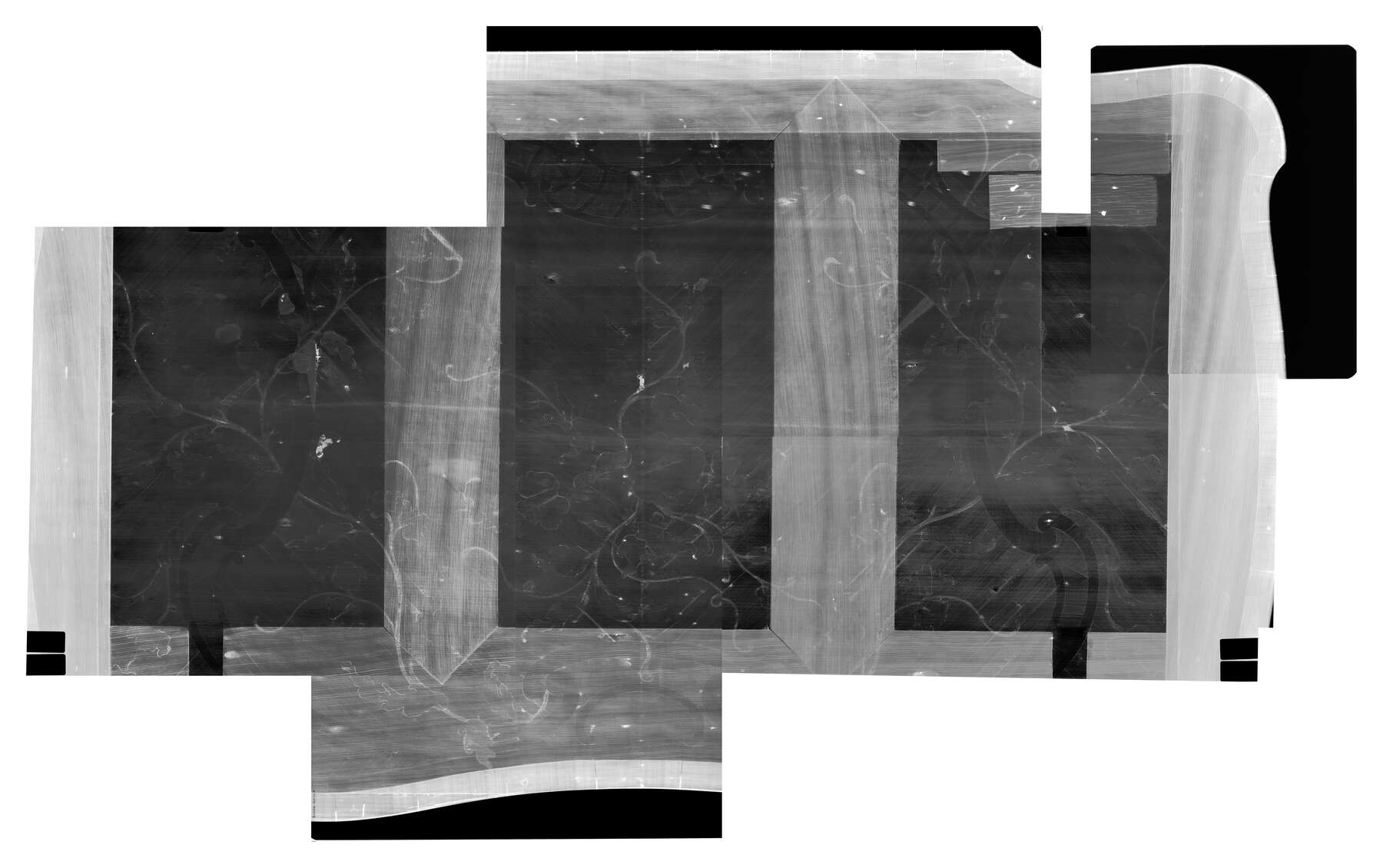 composite of black and white x-rays showing three black rectangles surrounded by smaller horizontal and vertical strips of wood